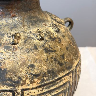 A Chinese archaistic bronze vase with taotie handles — photo 13