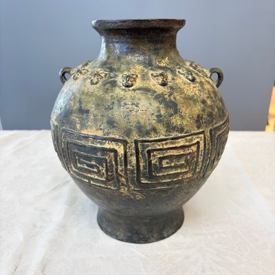 A Chinese archaistic bronze vase with taotie handles — photo 1
