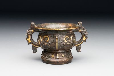 A Chinese archaistic gold and silver-inlaid bronze miniature censer, Ming