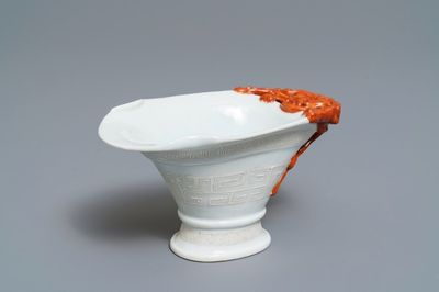 A Chinese 'bianco sopra bianco' and iron red libation cup, 19th C.