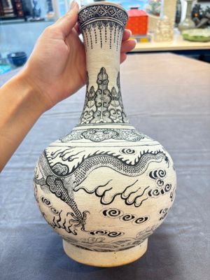 A Chinese black-enamelled biscuit 'Dragon' vase, Kangxi mark, 19th C. — photo 2