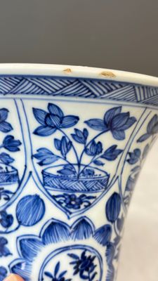 A Chinese blue and white five-piece garniture with floral design — photo 6