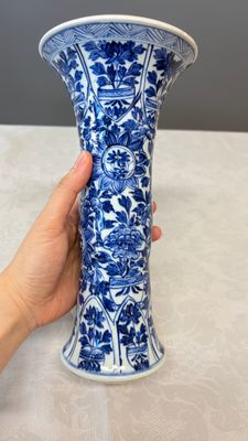 A Chinese blue and white five-piece garniture with floral design — photo 11