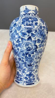 A Chinese blue and white five-piece garniture with floral design — photo 18