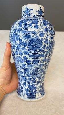 A Chinese blue and white five-piece garniture with floral design — photo 19