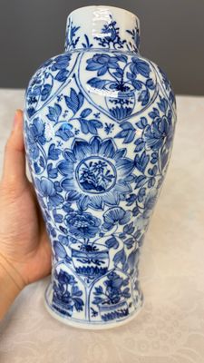 A Chinese blue and white five-piece garniture with floral design — photo 20