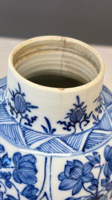 A Chinese blue and white five-piece garniture with floral design — photo 24