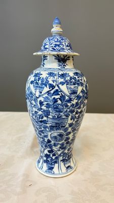 A Chinese blue and white five-piece garniture with floral design — photo 30