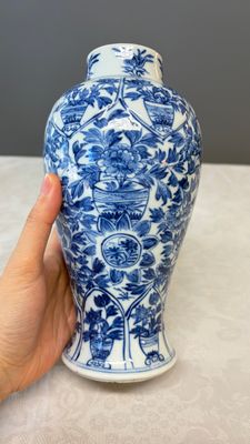A Chinese blue and white five-piece garniture with floral design — photo 31