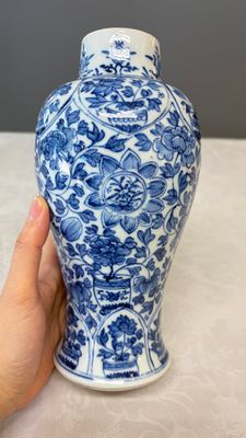 A Chinese blue and white five-piece garniture with floral design — photo 44