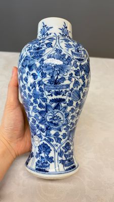 A Chinese blue and white five-piece garniture with floral design — photo 47
