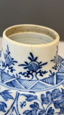 A Chinese blue and white five-piece garniture with floral design — photo 48
