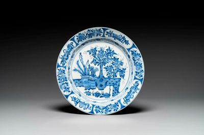 A Chinese blue and white 'antiquities' dish, Kangxi