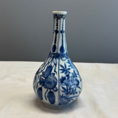 A Chinese blue and white 'Auspicious Emblems and Peonies' pear-shaped vase — photo 1