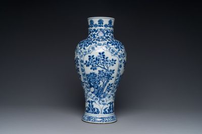 A Chinese blue and white baluster vase with floral design, Kangxi