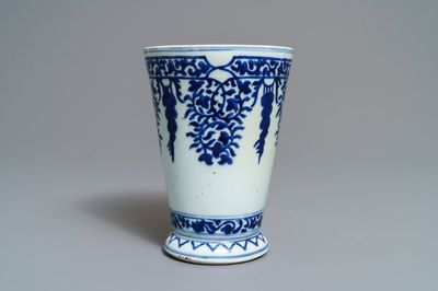 A Chinese blue and white beaker after a European silver model, Kangxi