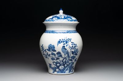 A Chinese blue and white 'birds among flowering branches' vase and cover, 19th C.