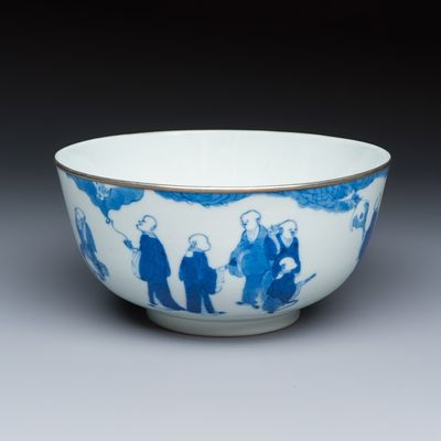 A Chinese blue and white 'Bleu de Hue' bowl with eighteen luohan, Nội phủ 內府 mark, 19th C.