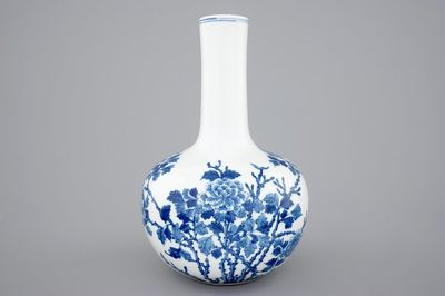 A Chinese blue and white bottle-shaped vase of floral design, 20th C.