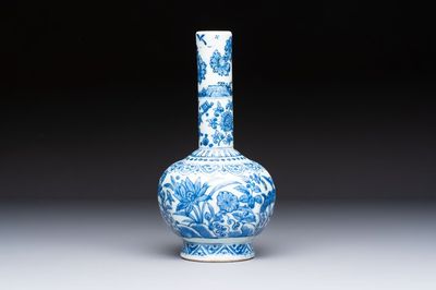 A Chinese blue and white bottle vase with floral design, hare mark, Wanli