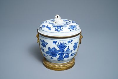 A Chinese blue and white bowl and cover with gilt bronze mounts, Kangxi