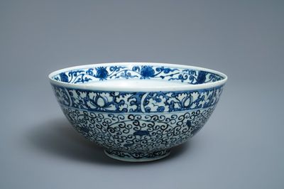A Chinese blue and white bowl with a qilin and flower scrolls, Wanli