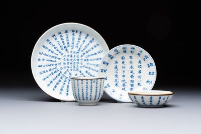 A Chinese blue and white 'Calligraphic' plate, a saucer, a box and a cup for the Thai market, Bao Zhu Li Ji 寶珠利記 and Man Tang Fu Ji 滿堂福記 mark, 19th C.