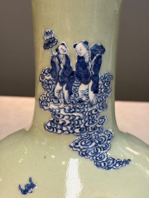 A Chinese blue and white celadon-ground 'Sanxing' bottle vase with relief design, 19th C. — photo 2