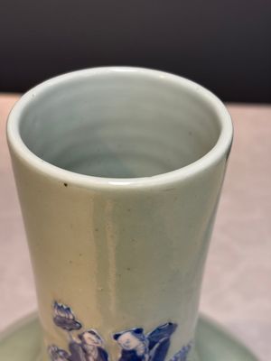 A Chinese blue and white celadon-ground 'Sanxing' bottle vase with relief design, 19th C. — photo 3