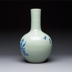 A Chinese blue and white celadon-ground 'Sanxing' bottle vase with relief design, 19th C. — photo 3