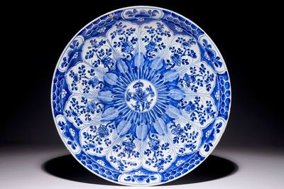A Chinese blue and white charger with floral design, Kangxi
