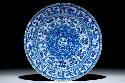 A Chinese blue and white charger with floral design, Kangxi