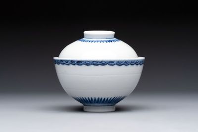 A Chinese blue and white covered bowl with incised floral design, Yongzheng/Qianlong