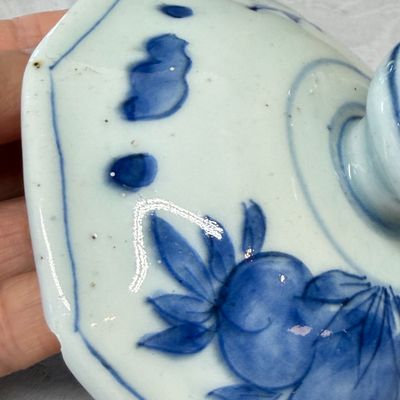 A Chinese blue and white covered vase with floral design — photo 22