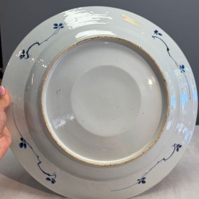 A Chinese blue and white dish with a raised medallion centre — photo 9