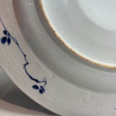 A Chinese blue and white dish with a raised medallion centre — photo 10