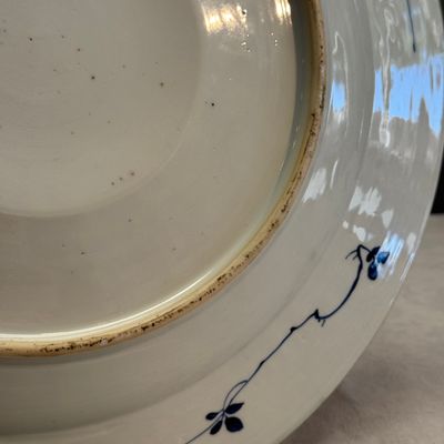 A Chinese blue and white dish with a raised medallion centre — photo 13