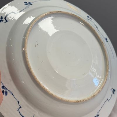 A Chinese blue and white dish with a raised medallion centre — photo 14