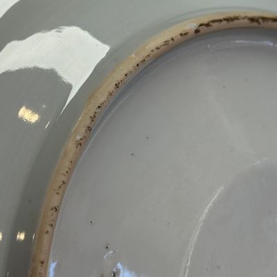 A Chinese blue and white dish with a raised medallion centre — photo 16