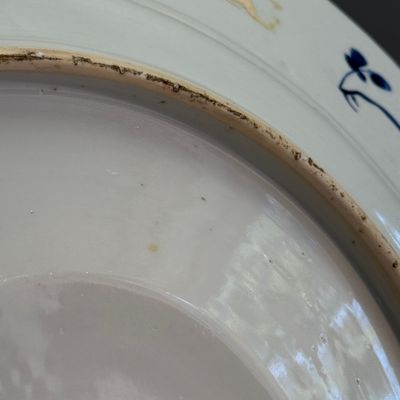 A Chinese blue and white dish with a raised medallion centre — photo 17