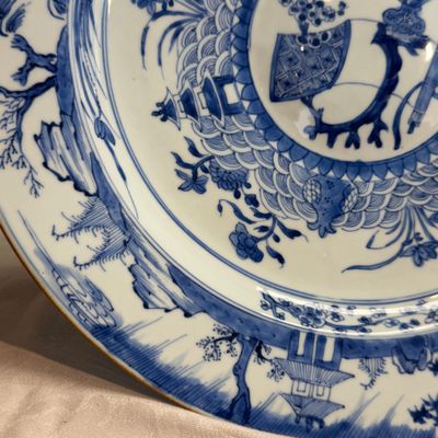 A Chinese blue and white dish with a raised medallion centre — photo 2