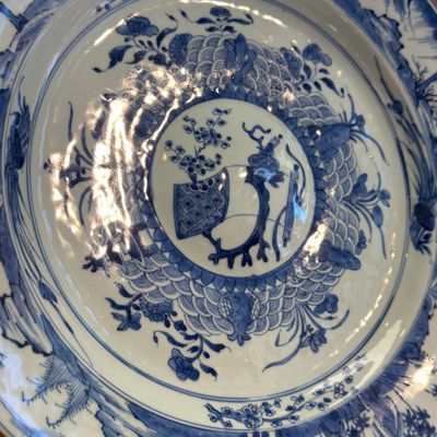 A Chinese blue and white dish with a raised medallion centre — photo 6