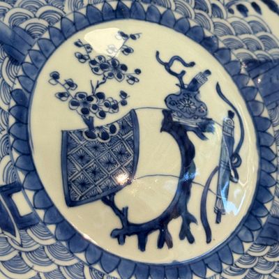 A Chinese blue and white dish with a raised medallion centre — photo 7