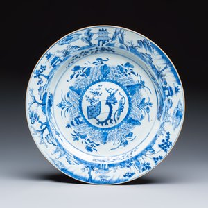 A Chinese blue and white dish with a raised medallion centre — photo 1