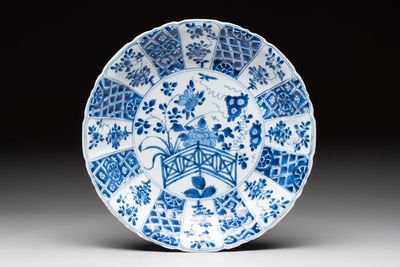 A Chinese blue and white dish with floral design, artemisia leaf mark, Kangxi