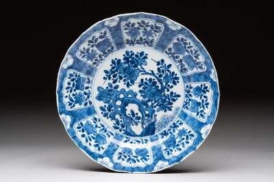 A Chinese blue and white dish with floral design, artemisia leaf mark, Kangxi