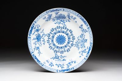 A Chinese blue and white dish with floral design, Kangxi mark, 19th C.