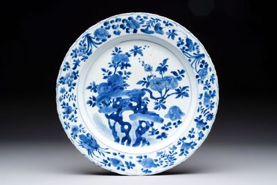 A Chinese blue and white dish with floral design, Kangxi mark and of the period