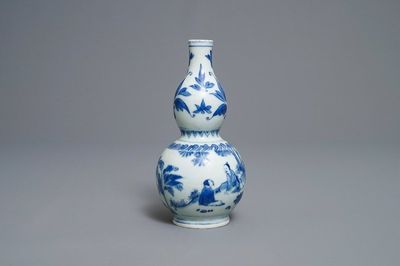 A Chinese blue and white double gourd vase, Transitional period