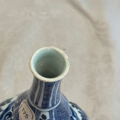 A Chinese blue and white double-gourd vase with floral design — photo 9